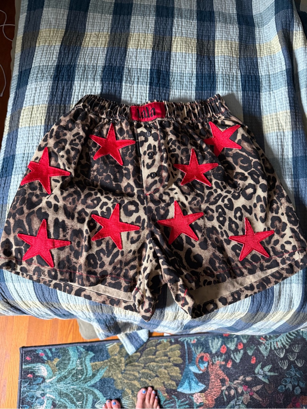 Dressed in LALA Leopard Print High Waist Shorts with Red Star Patches